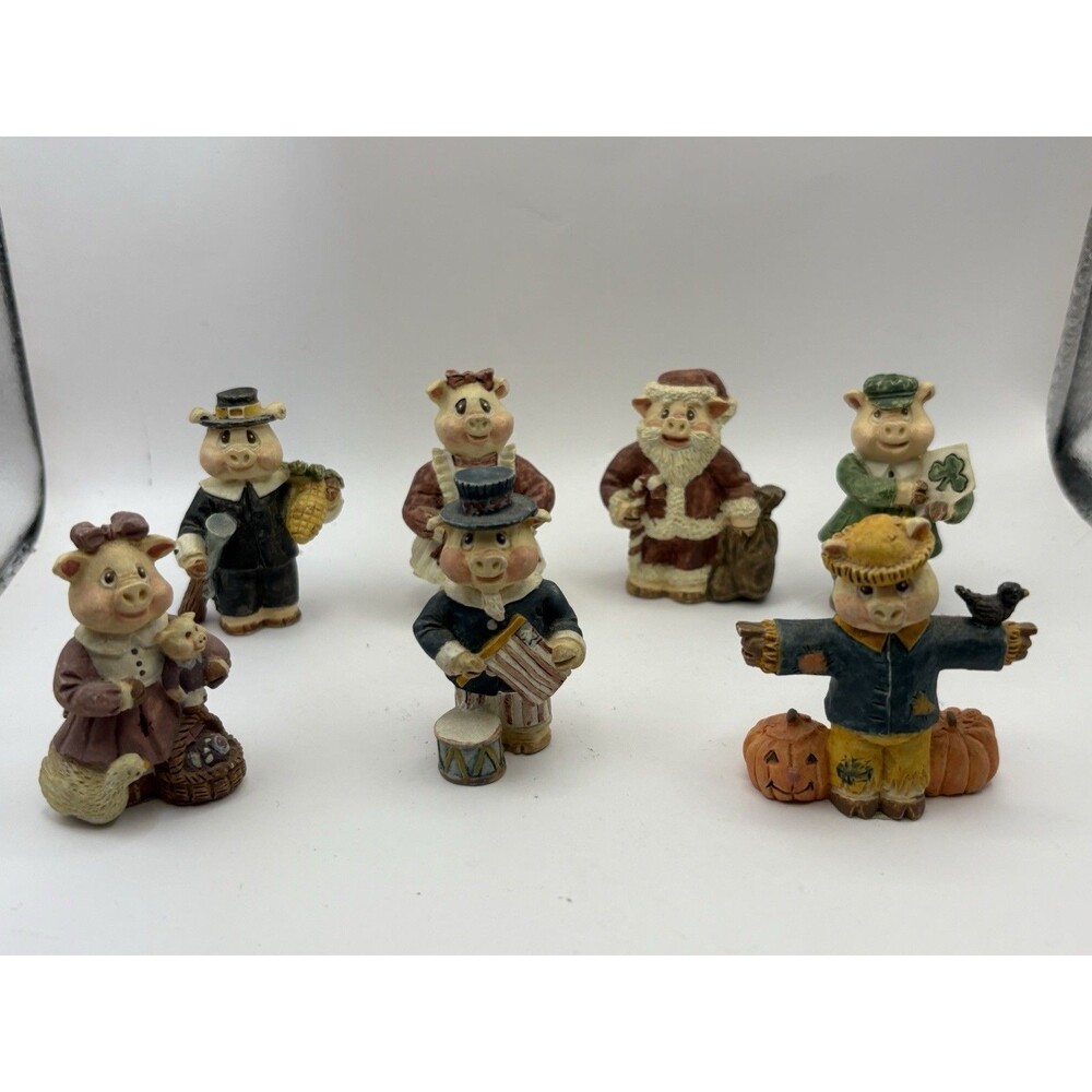 Vintage Holiday Pig Figurines Set of 7 Seasons Resin Made in China 1995